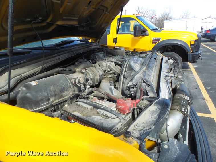 image for item DC4418 2008 Ford F550 Crew Cab flatbed dump truck