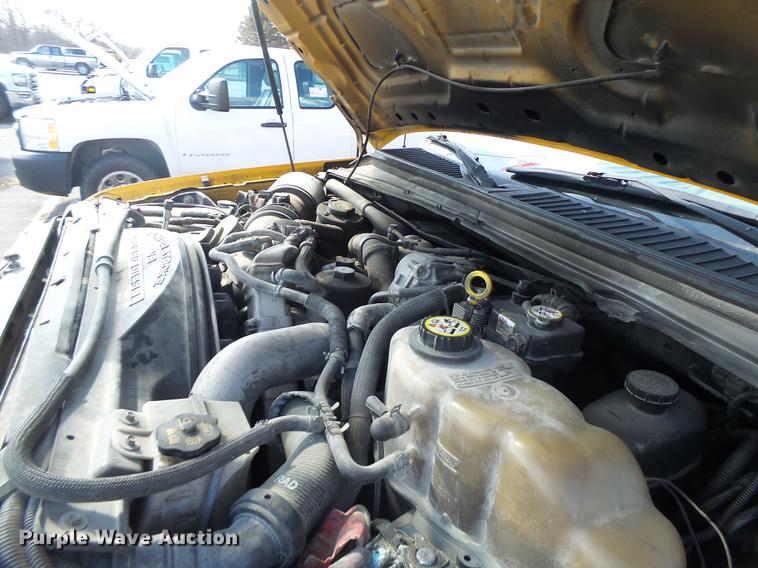 image for item DC4418 2008 Ford F550 Crew Cab flatbed dump truck