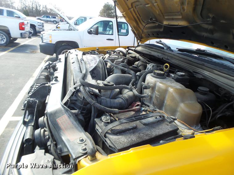 image for item DC4418 2008 Ford F550 Crew Cab flatbed dump truck