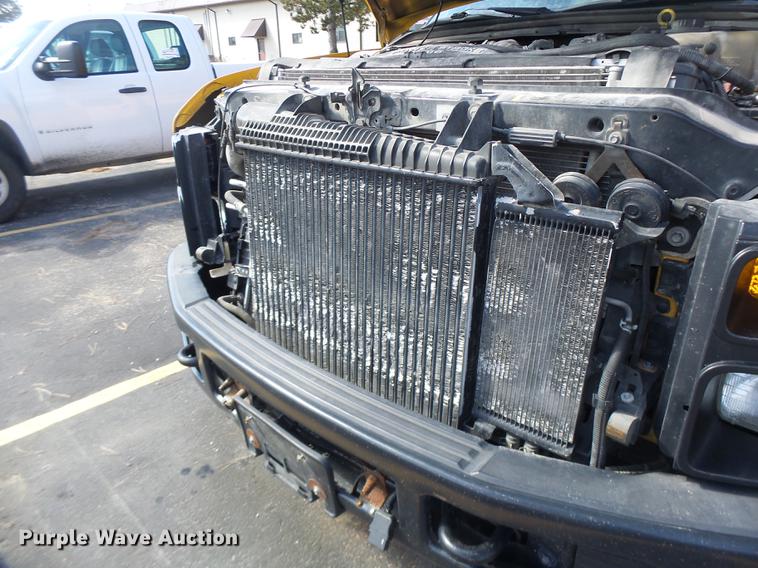 image for item DC4418 2008 Ford F550 Crew Cab flatbed dump truck