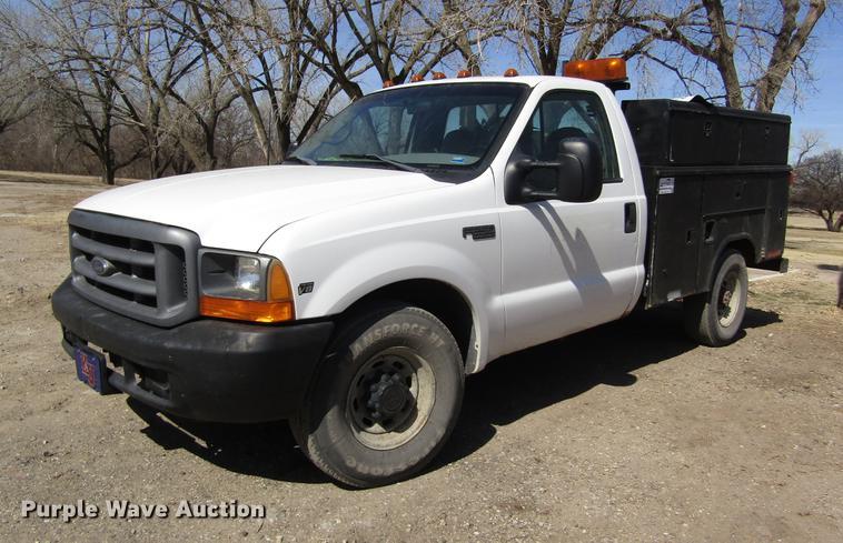 image for item DD8734 1999 Ford F250 Super Duty utility bed pickup truck