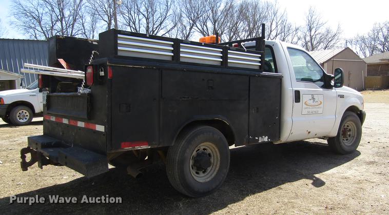 image for item DD8734 1999 Ford F250 Super Duty utility bed pickup truck