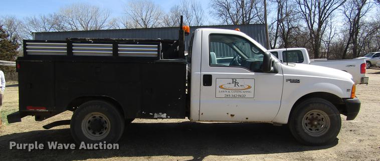 image for item DD8734 1999 Ford F250 Super Duty utility bed pickup truck