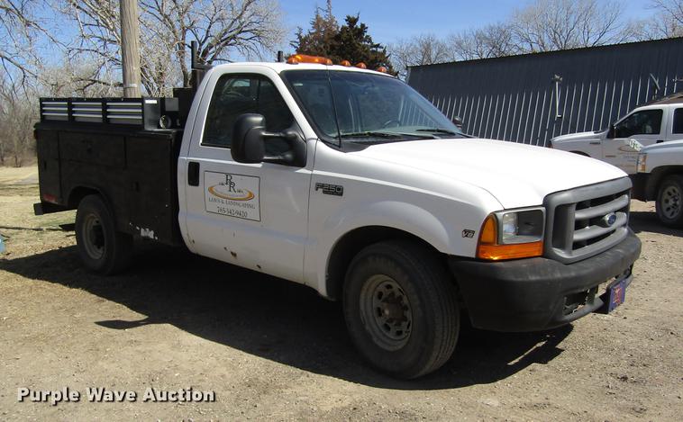 image for item DD8734 1999 Ford F250 Super Duty utility bed pickup truck