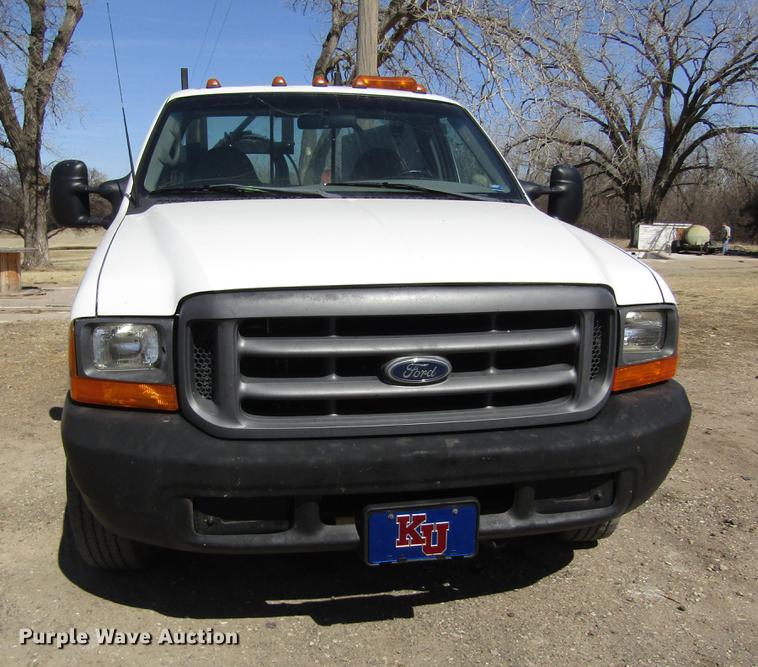 image for item DD8734 1999 Ford F250 Super Duty utility bed pickup truck