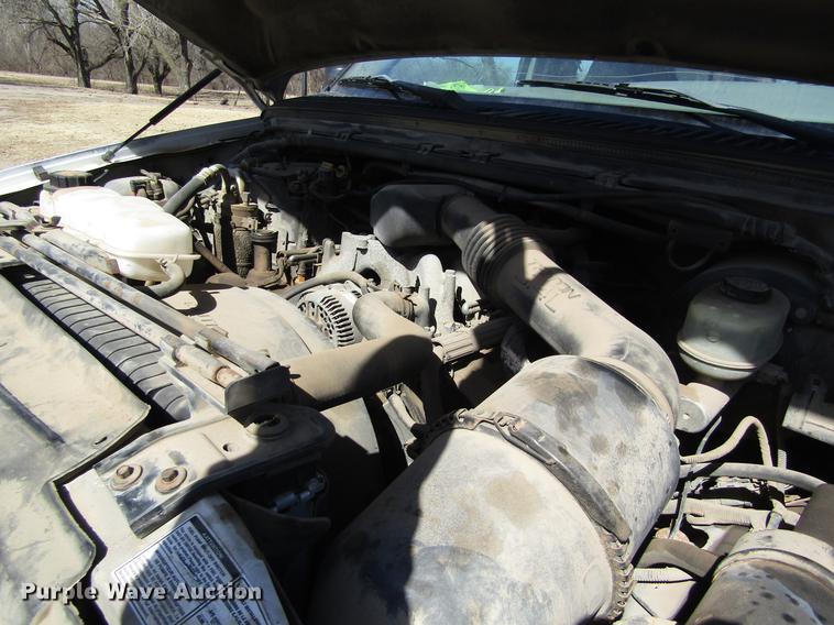 image for item DD8734 1999 Ford F250 Super Duty utility bed pickup truck