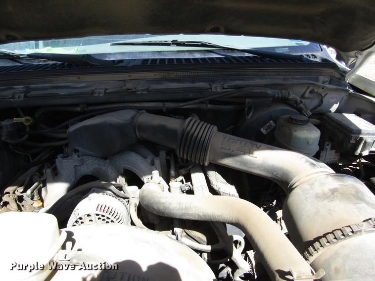 image for item DD8734 1999 Ford F250 Super Duty utility bed pickup truck