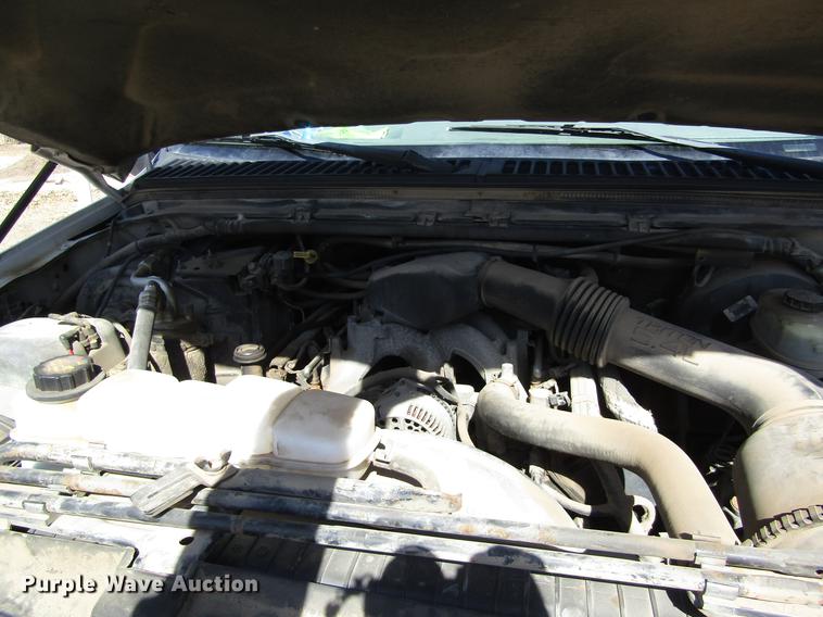 image for item DD8734 1999 Ford F250 Super Duty utility bed pickup truck