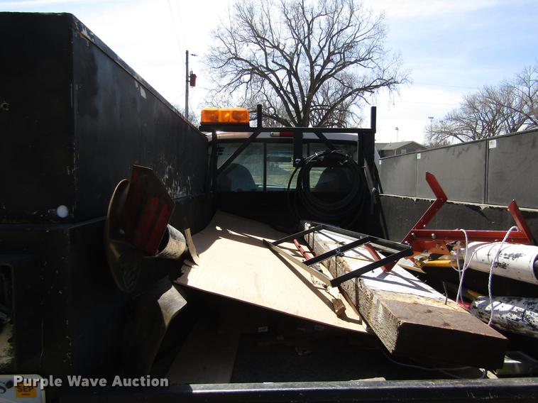 image for item DD8734 1999 Ford F250 Super Duty utility bed pickup truck