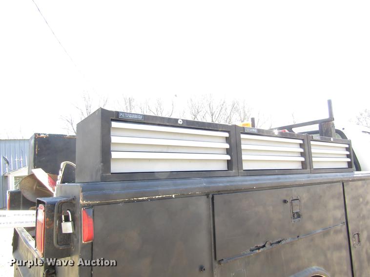 image for item DD8734 1999 Ford F250 Super Duty utility bed pickup truck