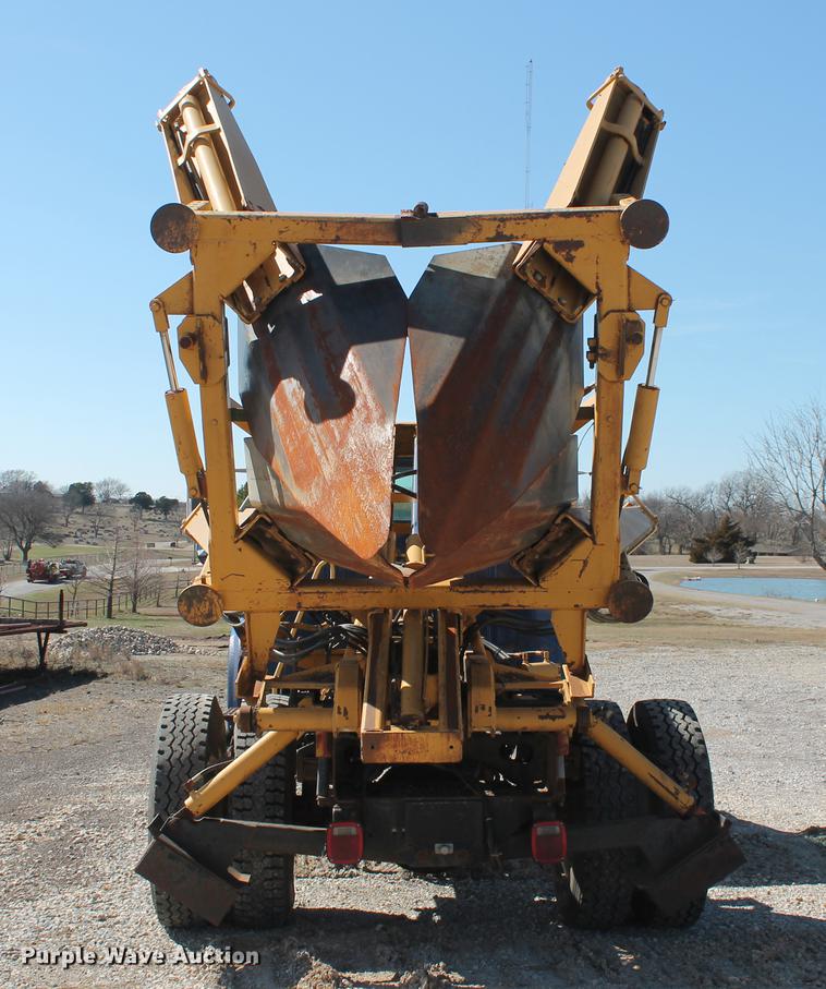 image for item DB5132 1996 International 4700 truck with Vermeer tree spade