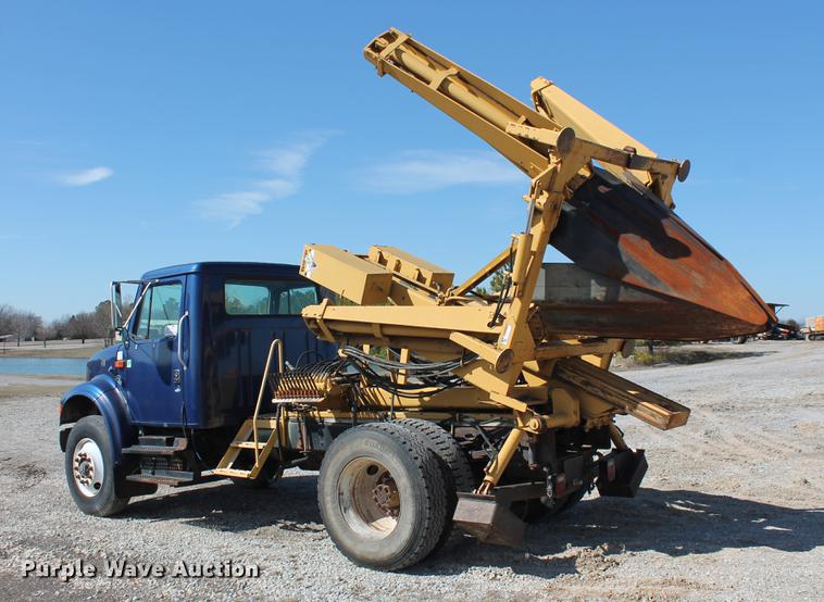 image for item DB5132 1996 International 4700 truck with Vermeer tree spade
