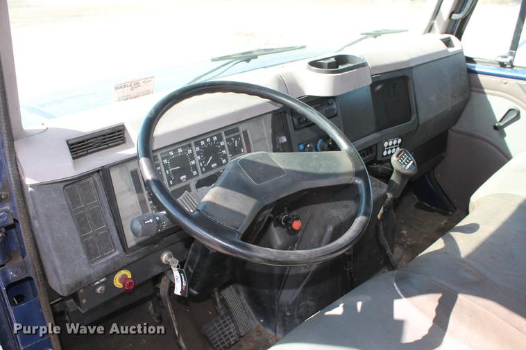 image for item DB5132 1996 International 4700 truck with Vermeer tree spade