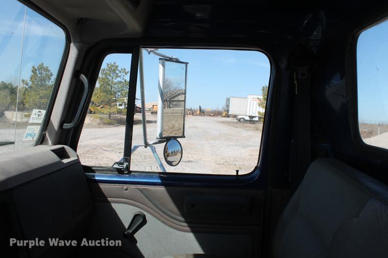image for item DB5132 1996 International 4700 truck with Vermeer tree spade