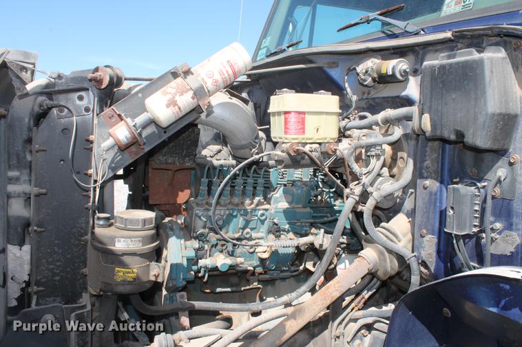 image for item DB5132 1996 International 4700 truck with Vermeer tree spade