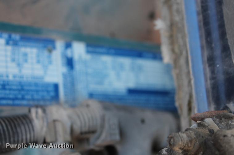 image for item DB5132 1996 International 4700 truck with Vermeer tree spade