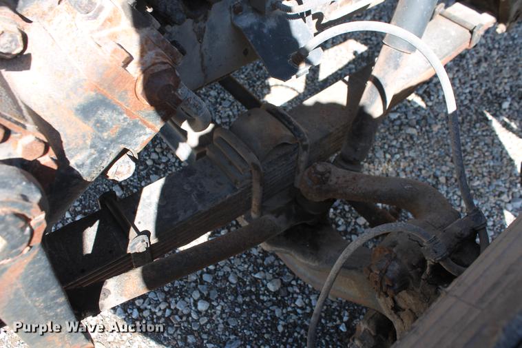 image for item DB5132 1996 International 4700 truck with Vermeer tree spade