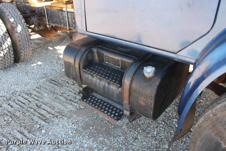 image for item DB5132 1996 International 4700 truck with Vermeer tree spade