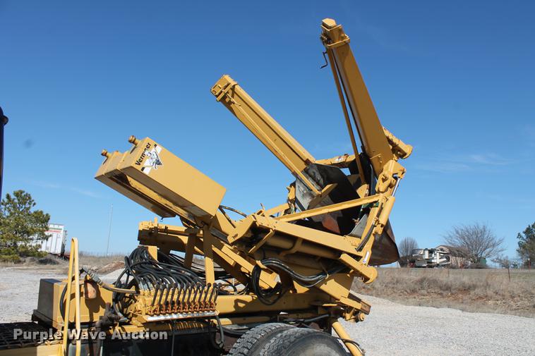 image for item DB5132 1996 International 4700 truck with Vermeer tree spade