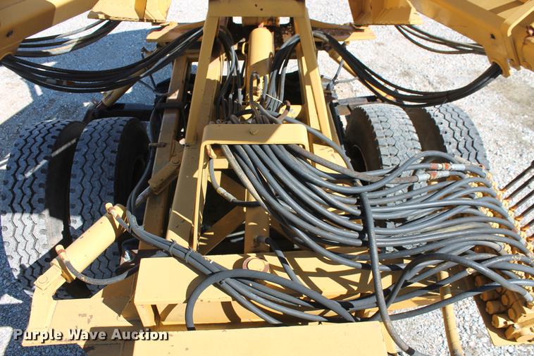 image for item DB5132 1996 International 4700 truck with Vermeer tree spade