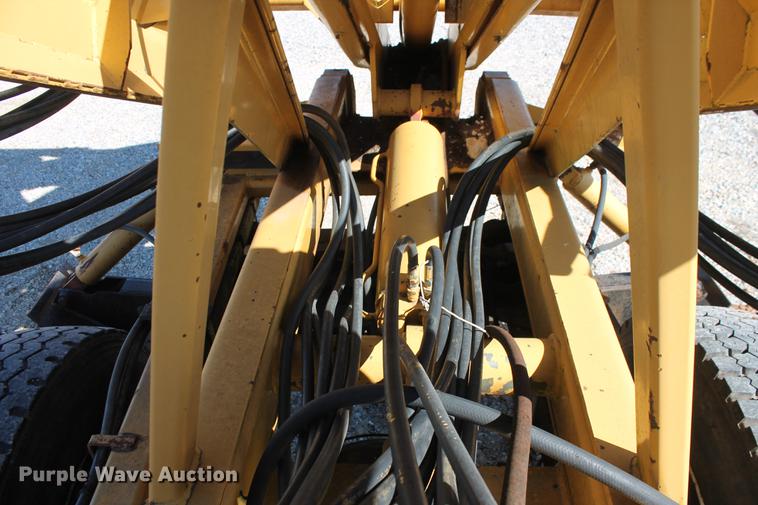 image for item DB5132 1996 International 4700 truck with Vermeer tree spade