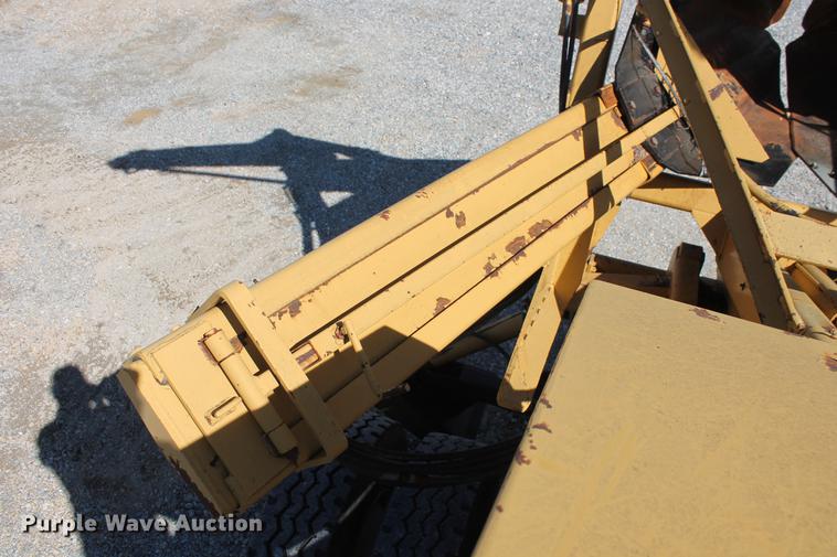 image for item DB5132 1996 International 4700 truck with Vermeer tree spade