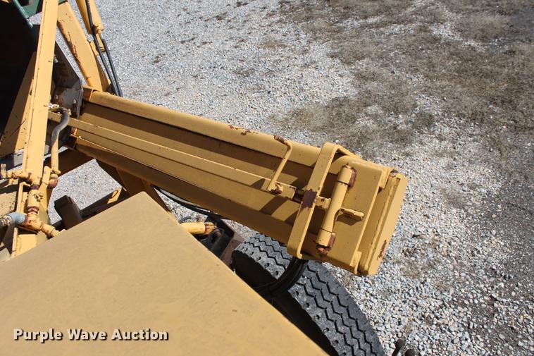 image for item DB5132 1996 International 4700 truck with Vermeer tree spade