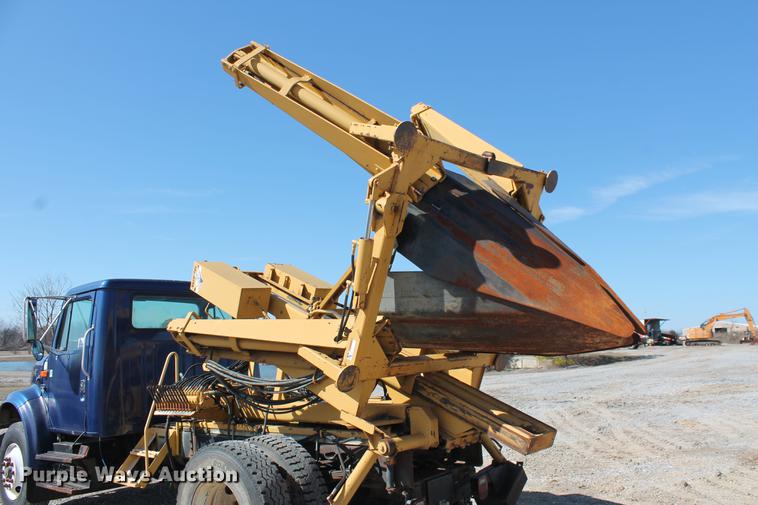 image for item DB5132 1996 International 4700 truck with Vermeer tree spade