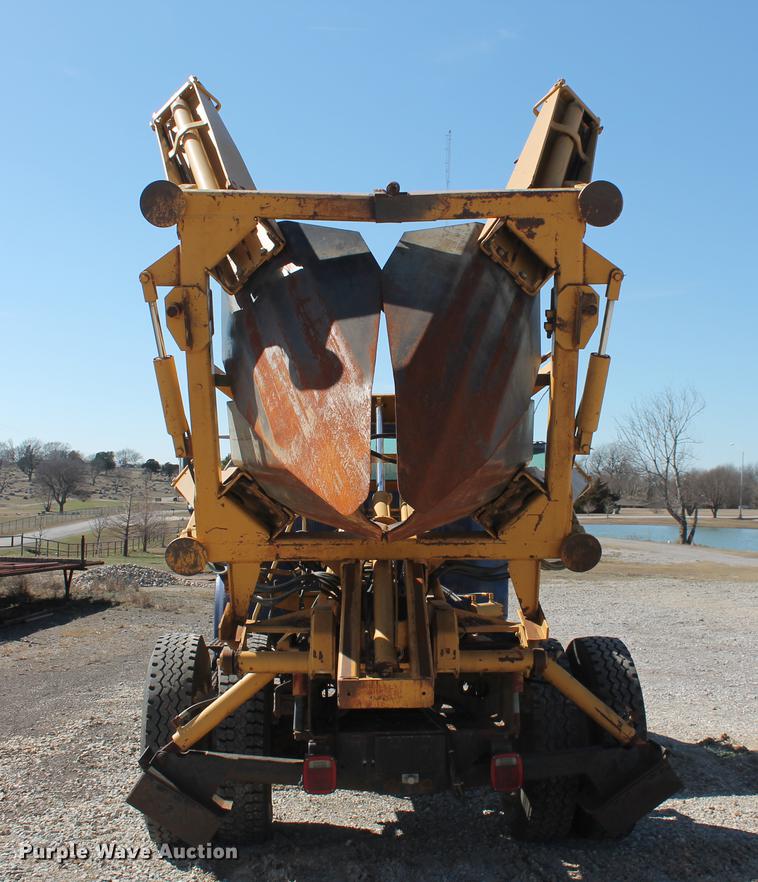 image for item DB5132 1996 International 4700 truck with Vermeer tree spade