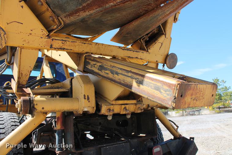 image for item DB5132 1996 International 4700 truck with Vermeer tree spade