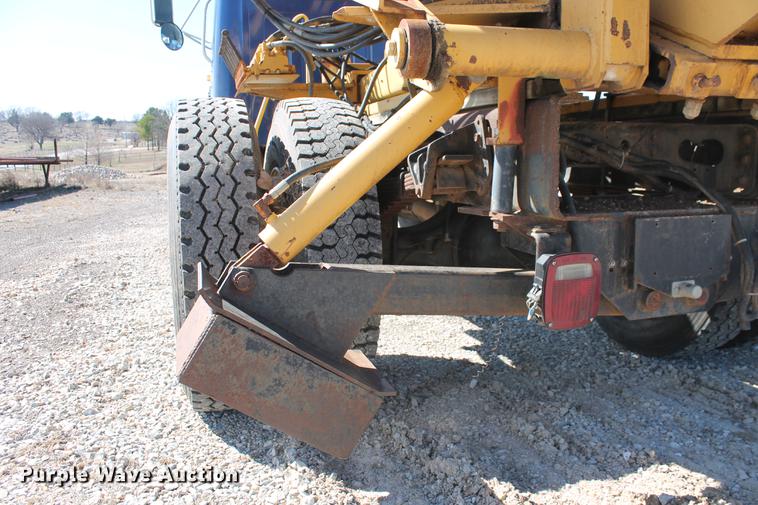 image for item DB5132 1996 International 4700 truck with Vermeer tree spade