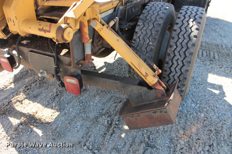 image for item DB5132 1996 International 4700 truck with Vermeer tree spade