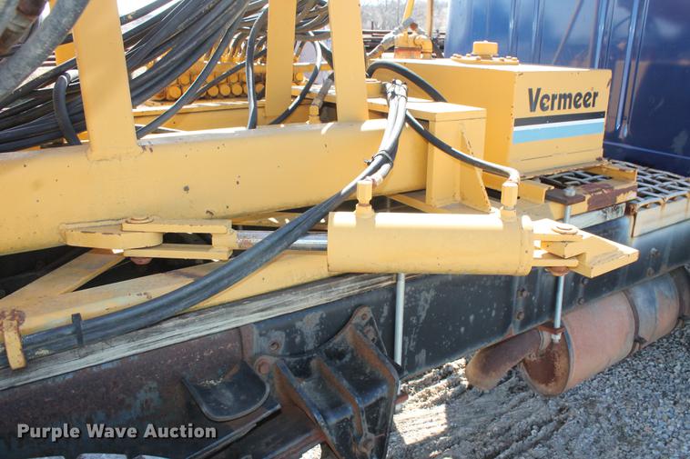 image for item DB5132 1996 International 4700 truck with Vermeer tree spade