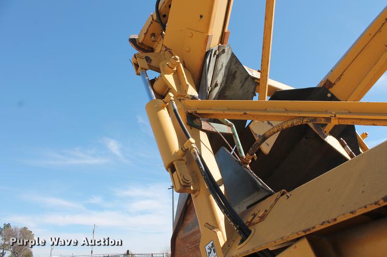 image for item DB5132 1996 International 4700 truck with Vermeer tree spade