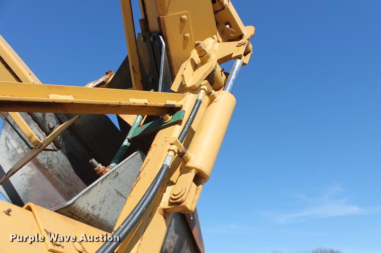 image for item DB5132 1996 International 4700 truck with Vermeer tree spade