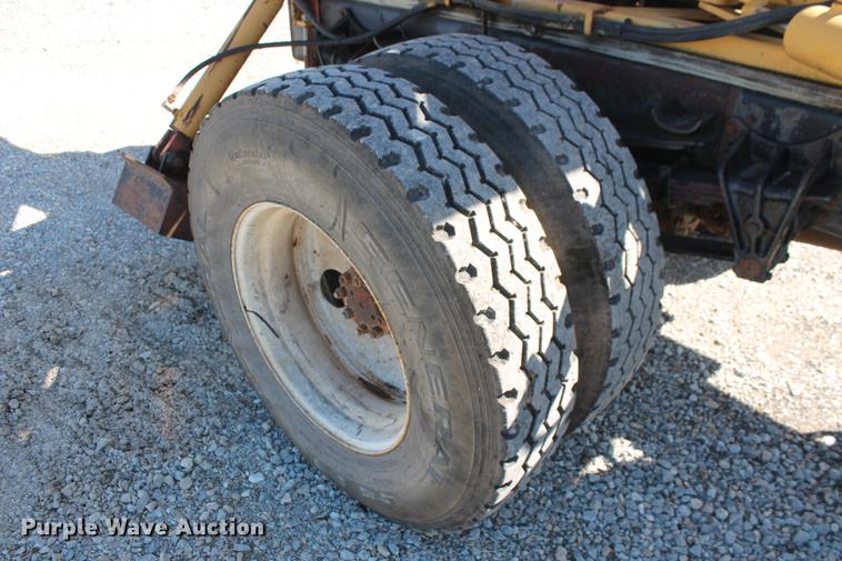 image for item DB5132 1996 International 4700 truck with Vermeer tree spade