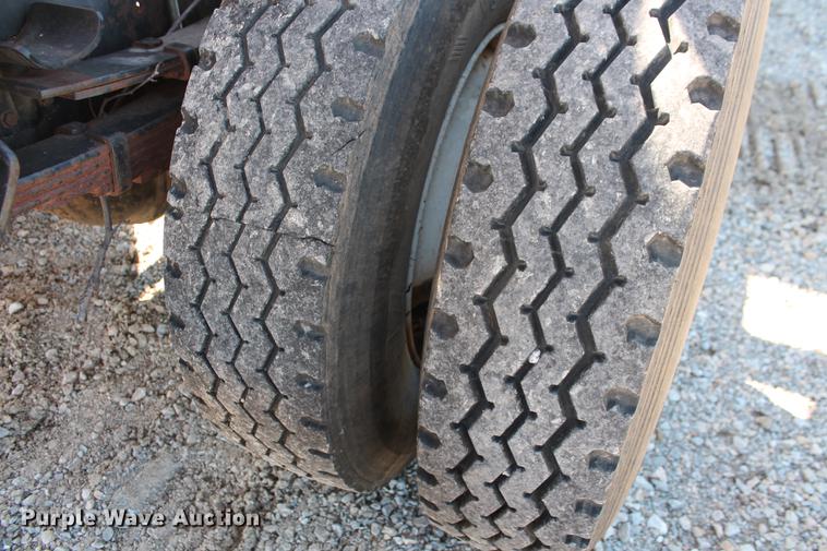 image for item DB5132 1996 International 4700 truck with Vermeer tree spade