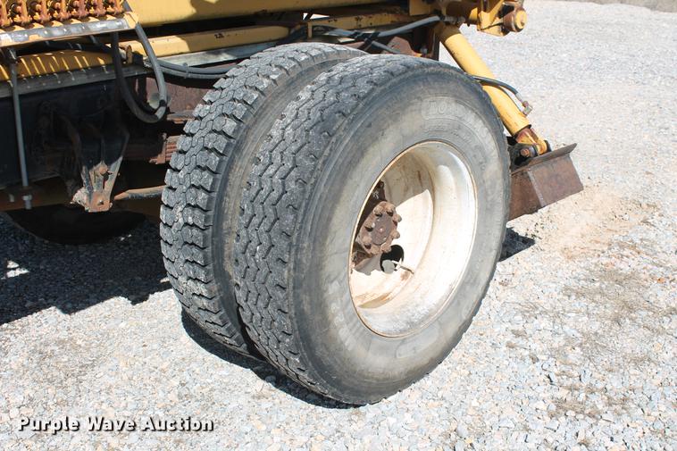 image for item DB5132 1996 International 4700 truck with Vermeer tree spade