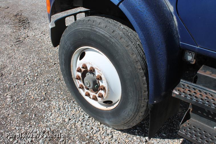 image for item DB5132 1996 International 4700 truck with Vermeer tree spade