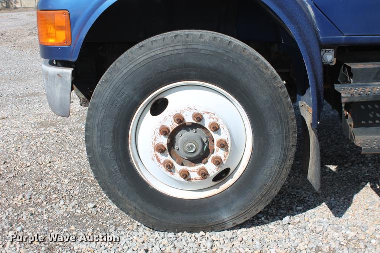 image for item DB5132 1996 International 4700 truck with Vermeer tree spade