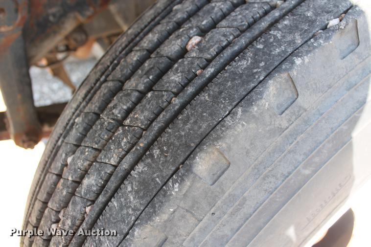 image for item DB5132 1996 International 4700 truck with Vermeer tree spade