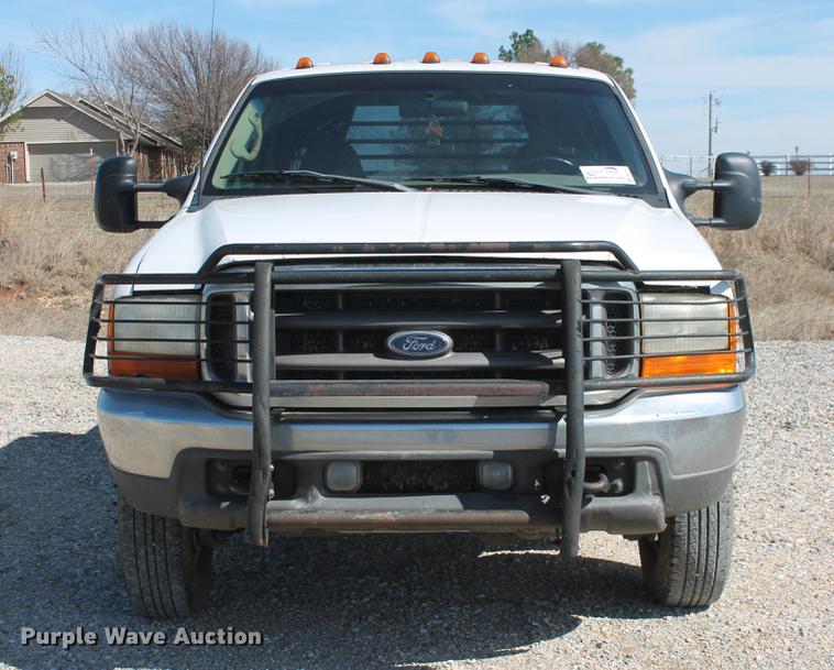 image for item DB5143 2001 Ford F350 Super Duty XL Crew Cab flatbed pickup truck