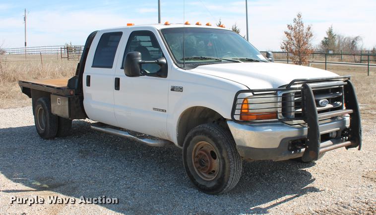 image for item DB5143 2001 Ford F350 Super Duty XL Crew Cab flatbed pickup truck