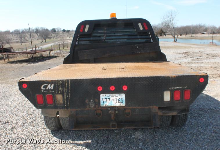 image for item DB5143 2001 Ford F350 Super Duty XL Crew Cab flatbed pickup truck