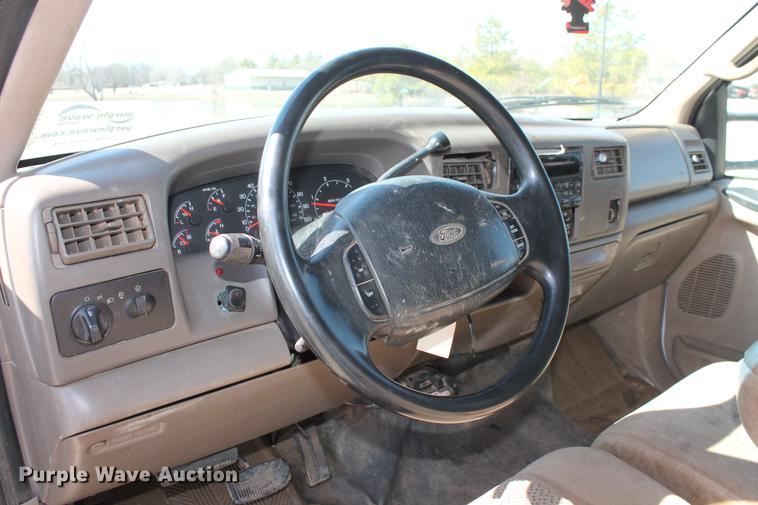 image for item DB5143 2001 Ford F350 Super Duty XL Crew Cab flatbed pickup truck