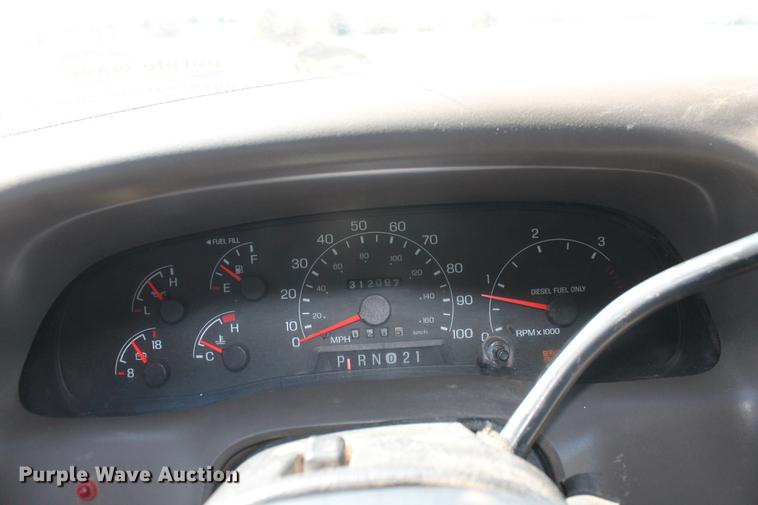 image for item DB5143 2001 Ford F350 Super Duty XL Crew Cab flatbed pickup truck