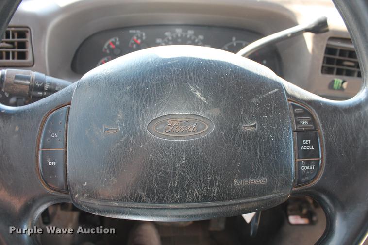 image for item DB5143 2001 Ford F350 Super Duty XL Crew Cab flatbed pickup truck