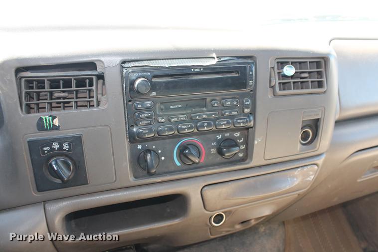 image for item DB5143 2001 Ford F350 Super Duty XL Crew Cab flatbed pickup truck