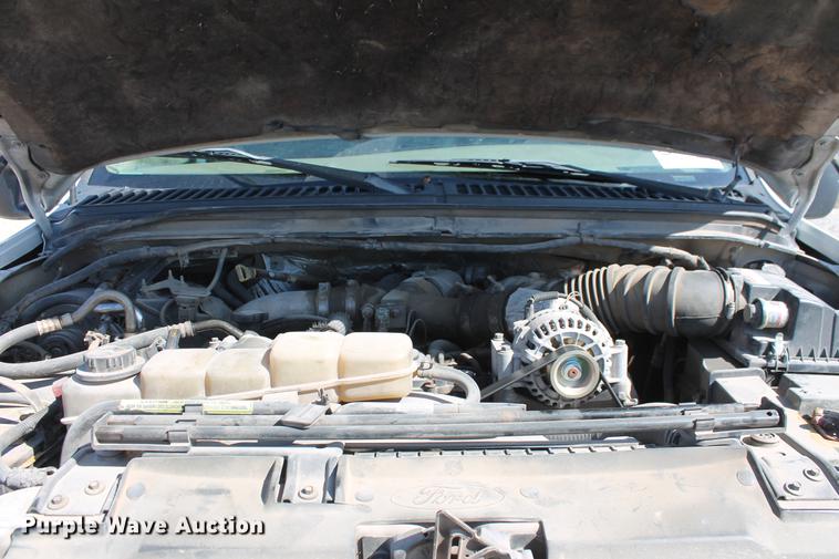 image for item DB5143 2001 Ford F350 Super Duty XL Crew Cab flatbed pickup truck