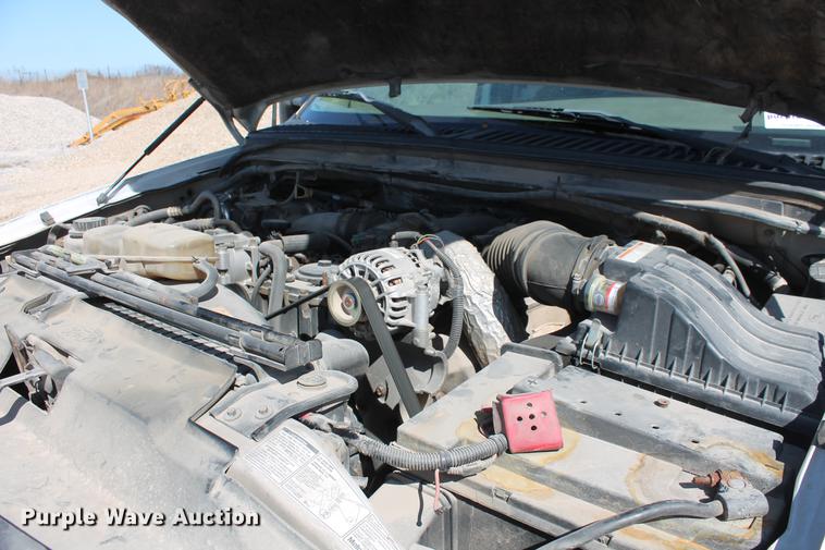 image for item DB5143 2001 Ford F350 Super Duty XL Crew Cab flatbed pickup truck